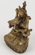 A Tibetan bronze figure group, 19th/20th century,  11cm high  - 2