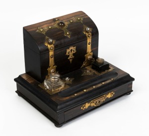 An antique English desk set compendium in the high gothic style, zebra wood and gilt metal with cabochon stones, 19th century, 24cm high, 30cm wide, 24cm deep