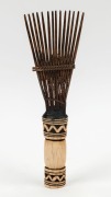 A tribal hair comb, carved tooth, wood and fibre, African origin,&nbsp; 23.5cm long - 2