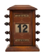 An antique desk calendar, late 19th century,  15cm high 