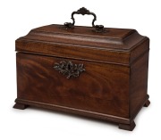 An antique Continental mahogany tea caddy, interior fitted with three zinc lined canisters, early 19th century,&nbsp; ​​​​​​​17cm high, 24.5cm wide, 14cm deep&nbsp;