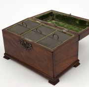 An antique Continental mahogany tea caddy, interior fitted with three zinc lined canisters, early 19th century,&nbsp; ​​​​​​​17cm high, 24.5cm wide, 14cm deep&nbsp; - 2