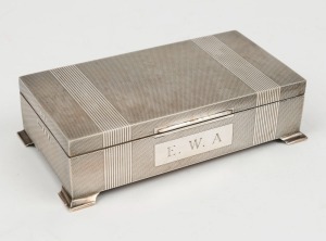 An English Art Deco sterling silver box with cedar lining by HARDY BROS, 20th century, 5cm high, 17cm wide, 9.5cm deep