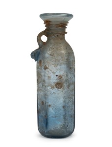 A Roman style blue glass oil bottle, unknown age,  ​​​​​​​22.5cm high 