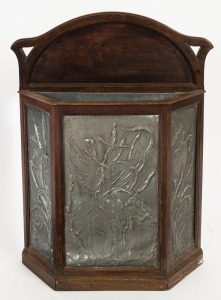 A French Art Nouveau umbrella stand, walnut and pressed metal, circa 1895, ​​​​​​​88cm high, 67cm wide, 17cm deep