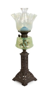 An antique banquet lamp with lemon vaseline glass shade, green vaseline font, single burner bronze floral base, 19th century, 65cm high overall