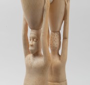 An African carved ivory figural sculpture on burl timber base, early to mid 20th century, ​​​​​​​61cm high - 2