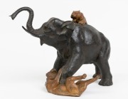 A Japanese bronze statue of an elephant being attacked by two tigers, 20th century, ​​​​​​​22.5cm high, 34cm long