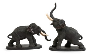 A pair of antique Japanese bronze elephant statues, Meiji period, 19th/20th century, the larger 21cm high