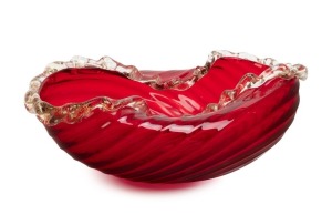 A Murano ruby glass fruit bowl with aventurina rolled rim, circa 1950s, 12cm high, 32cm wide