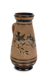 DOULTON LAMBETH pottery jug with bird decoration by FLORENCE BARLOE, stamped "Doulton Lambeth, 1883" with artist monogram, 23cm high