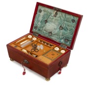 A fine Georgian sewing casket, sarcophagus shaped covered in scarlet leather with silver name plaque, interior sumptuously fitted with original compartments and contents, early 19th century, 14cm high, 28cm wide, 18cm deep - 2