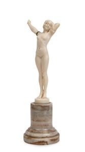 SASSON carved ivory statue of a female nude, on turned onyx base, early 20th century, signed "L. Sasson", 16.5cm high
