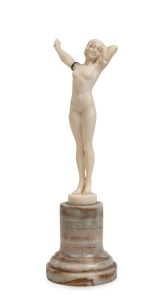 SASSON carved ivory statue of a female nude, on turned onyx base, early 20th century, signed "L. Sasson", 16.5cm high