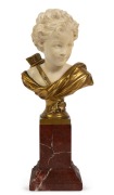 AGATHON LÉONARD (France, 1841-1923), Cupid, carved ivory bust with gilt bronze mount on rouge marble base, 19th century, signed "A. Léonard", 24cm high