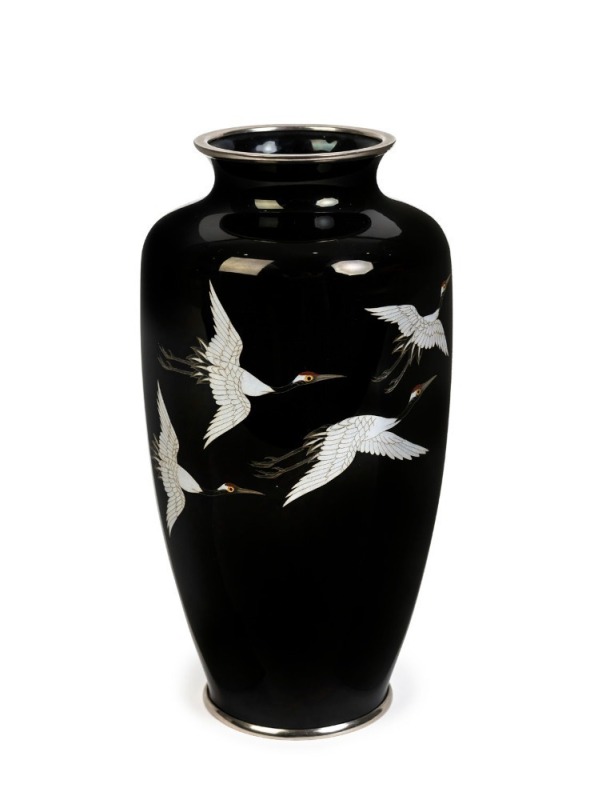 A Japanese cloisonne vase with flying cranes on black ground, Showa Period, 20th century, 22cm high