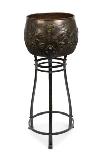 An antique English Arts and Crafts planter stand, copper and wrought iron, early 20th century,  111cm high, 45cm wide