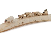 A walrus marine ivory ornament with dog sled and polar bears, engraved "ALOWA, R. SAVOONGA, A.K.", ​​​​​​​47cm long - 2