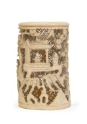 An antique Chinese carved ivory brush pot, Qing Dynasty, 19th century, 12cm high, 