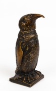 An Art Deco novelty penguin table cigar lighter, circa 1930, ​​​​​​​21.5cm high