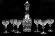 WATERFORD wine decanter, together with a set of six crystal wine glasses, (7 items), acid etched marks to the bases, the decanter 34cm high, the glasses 14.5cm high