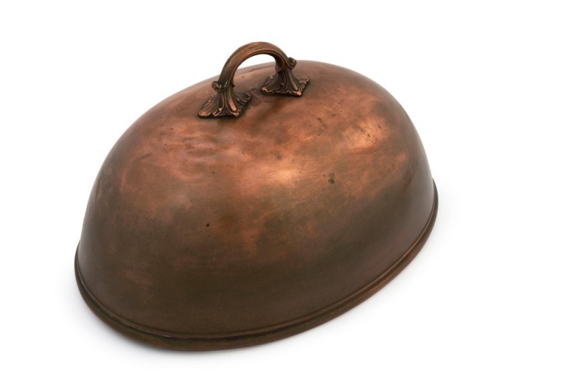 An antique copper meat dish cover, 19th century, 22cm high, 40cm wide