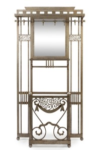 A fine French Art Deco wrought iron hall stand with hand beaten patinated finish, circa 1925, ​​​​​​​195cm high, 96cm wide, 28cm deep