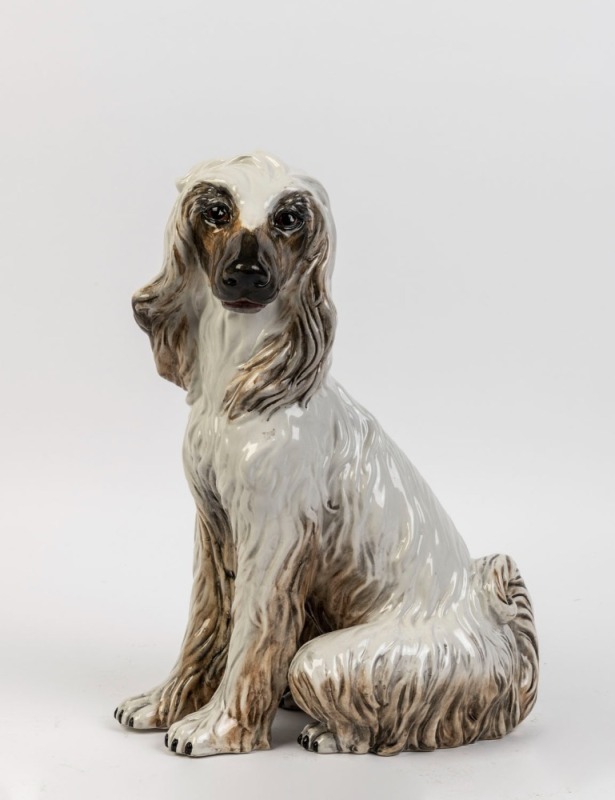 An Italian ceramic dog statue, mid 20th century, ​​​​​​​42cm high