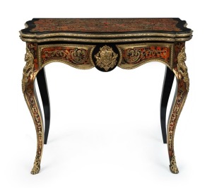 A fine French boulle fold-over card table, profusely inlaid with scroll brass floral marquetry on red tortoiseshell ground and adorned with handsome ormolu mounts, circa 1870, 80cm high, 90cm wide, 45cm (extends to 89cm) deep