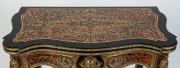A fine French boulle&nbsp;fold-over card table, profusely inlaid with scroll brass floral marquetry on red tortoiseshell ground and adorned with handsome ormolu mounts, circa 1870, 80cm high, 90cm wide, 45cm (extends to 89cm) deep - 3