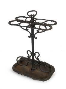 An antique French cast iron umbrella stand with black painted finish, 19th century, 64cm high