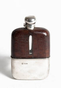HIP FLASK: Sterling silver and leather, Sheffield, early 20th century, 14.5cm high