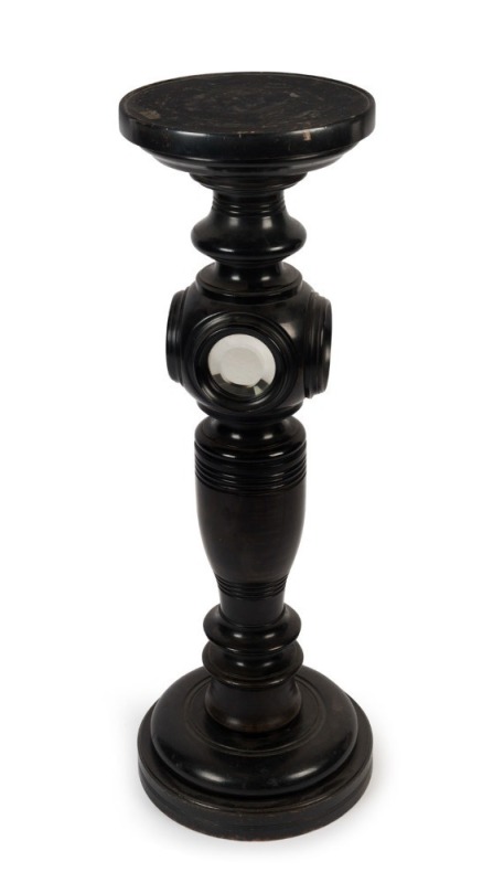 An antique ebonized timber pedestal with mirrored decoration, late 19th century, ​​​​​​​95cm high