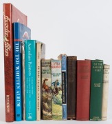 AUSTRALIAN INTEREST: A shelf of books including "On the Barrier Reef" by Napier (1934); "History of the Australian Bushrangers" by Boxsll (1935); "Australia My Country" by Barrett (1941); "Australian Nature Stories" by Monro (1944); "Under the Southern Cr