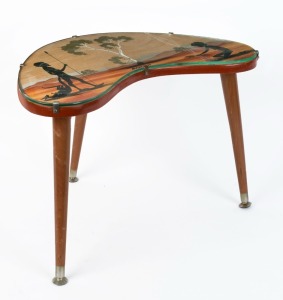 BILL ONUS vintage boomerang shaped occasional table with hand-painted Aboriginal scene, circa 1955, with ink stamp to base "Made in Australia by Bill Onus" and titled "Barmah", 35cm high, 52cm wide, 33cm deep