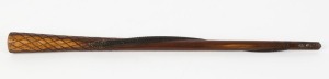 An antique Australian stock whip handle with Aboriginal carved snake motif, early 20th century, 52.5cm long