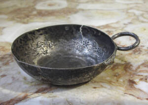 French silver wine taster, late 17th century set with a Louis XIIII half Ecu coin c1694.