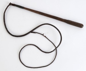 An antique Australian stock whip, with carved handle and engraved owner's monogram "W. R.", 19th century, the handle 50cm long