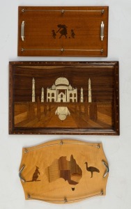 Two Australiana timber serving trays, together with an Indian plaque of the Taj Mahal, 20th century, (3 items), the trays 51cm across the handles