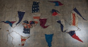 SIGNAL FLAGS, collection of maritime flags on hemp rope, early to mid 20th century