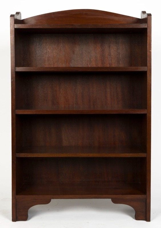 An Australian blackwood set of open bookshelves with an arch-top rail back and bracket feet, circa 1920, 122cm high, 77cm wide, 34cm deep