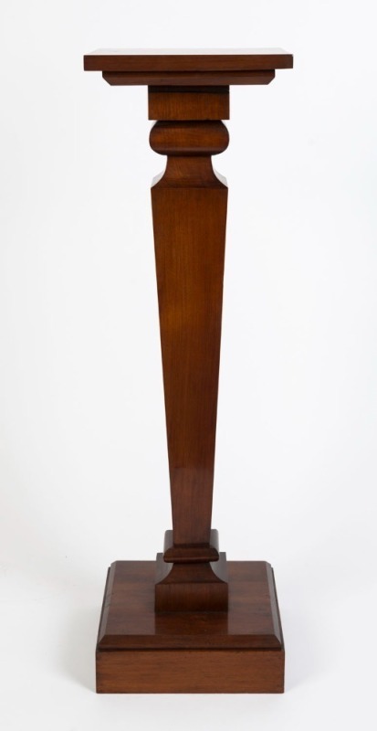 An Australian blackwood pedestal with square top, conforming plinth base and tapering column, circa 1920, 98.5cm high, 29cm wide, 29cm deep