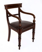 An Australian cedar spade back carver chair, 19th century, 87cm high, 52.5cm across the arms, 50cm deep