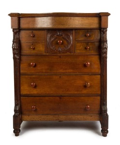 An antique Australian cedar eight drawer chest with serpentine front and carved full length corbels, South Australian origin, 19th century, with red pine and Baltic pine secondary timbers, 147cm high, 117cm wide, 58cm deep