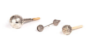 BABY RATTLES: Group of 3 eastern silver rattles. 12cm to 16cm