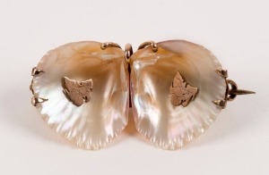 TAYLOR & SHARP of Hobart, shell brooch mounted in rose gold with Tasmanian maps, 4cm wide