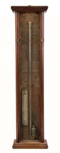 T. GAUNT & Co. "ADMIRAL FITZROY" barometer in cedar case, printed paper adapted for the southern hemisphere with rack and pinion verniers, and silvered thermometer scale. Remains of T. Gaunt label verso, 19th century,99cm high