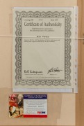 BOB DYLAN, original autograph in blue felt-tip pen on attractive photograph of Dylan; framed and glazed. Accompanied by a Certificate of Authenticity from R&R Enterprises, New Hampshire, and a PSA/DNA Certificate of Authenticity. - 2