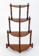 An antique English four tier wotnot with barley twist columns, walnut and mahogany, circa 1875, ​​​​​​​99cm high, 62cm wide, 26cm deep