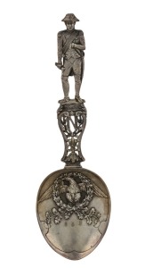 An antique French commemorative presentation spoon with repousse decoration depicting Napoleon; remnants of original silver-gilt finish; hallmarks to the bowl. 27.5cm long, 150 grams.